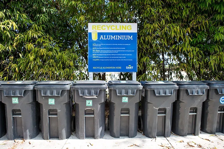 Row of recycling bins in camana bay